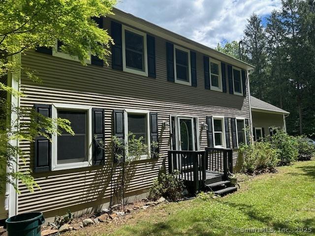 149 Mill Hill Rd, Colchester, CT 06415 - view of front of house featuring a front yard