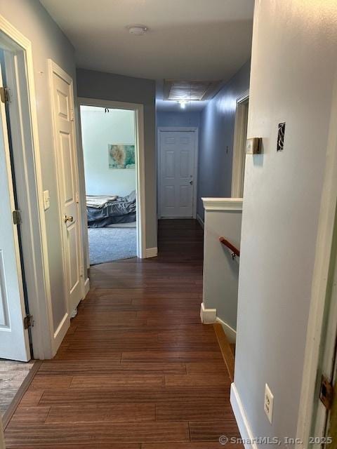 149 Mill Hill Rd, Colchester, CT 06415 - hall featuring dark wood-type flooring, an upstairs landing, and baseboards