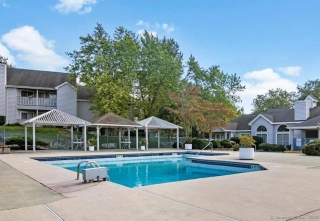 71 Leafwood Ln Unit 294, Groton, CT 06340 - community pool with a gazebo and a patio area