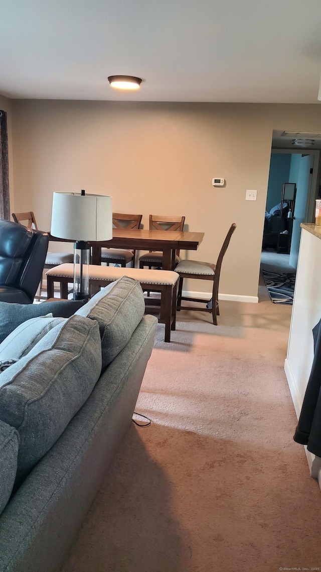 71 Leafwood Ln Unit 294, Groton, CT 06340 - carpeted living area featuring baseboards