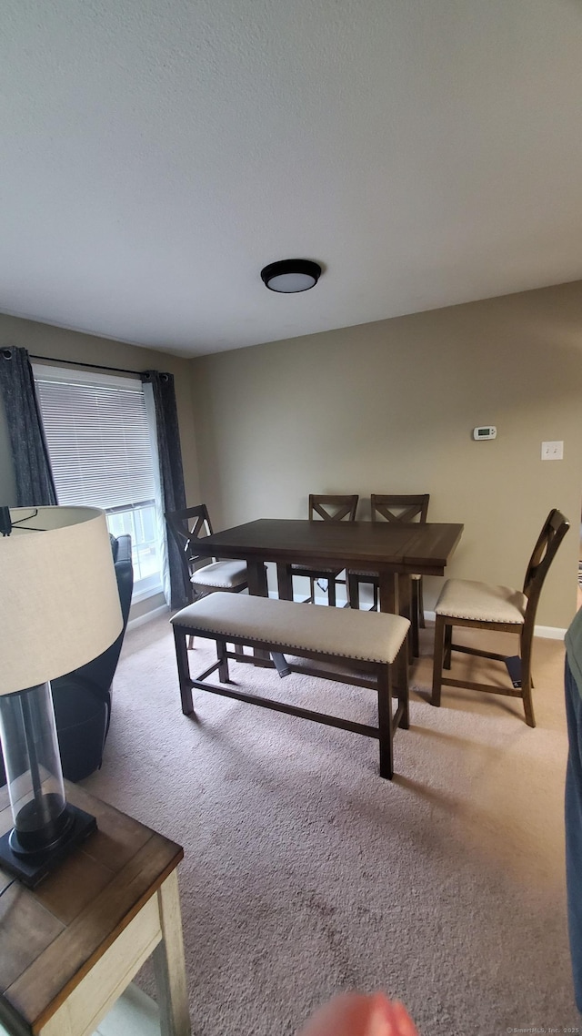 71 Leafwood Ln Unit 294, Groton, CT 06340 - carpeted dining space featuring baseboards
