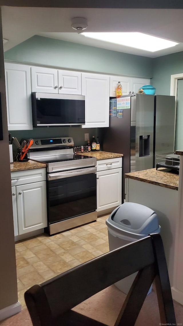 71 Leafwood Ln Unit 294, Groton, CT 06340 - kitchen featuring stainless steel appliances, white cabinets, and light countertops
