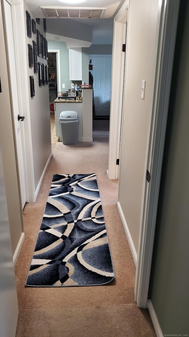 71 Leafwood Ln Unit 294, Groton, CT 06340 - hall with light colored carpet and baseboards
