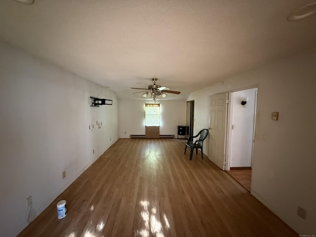 81 Melrose Dr, New Haven, CT 06513 - unfurnished living room with a ceiling fan, wood finished floors, and baseboards