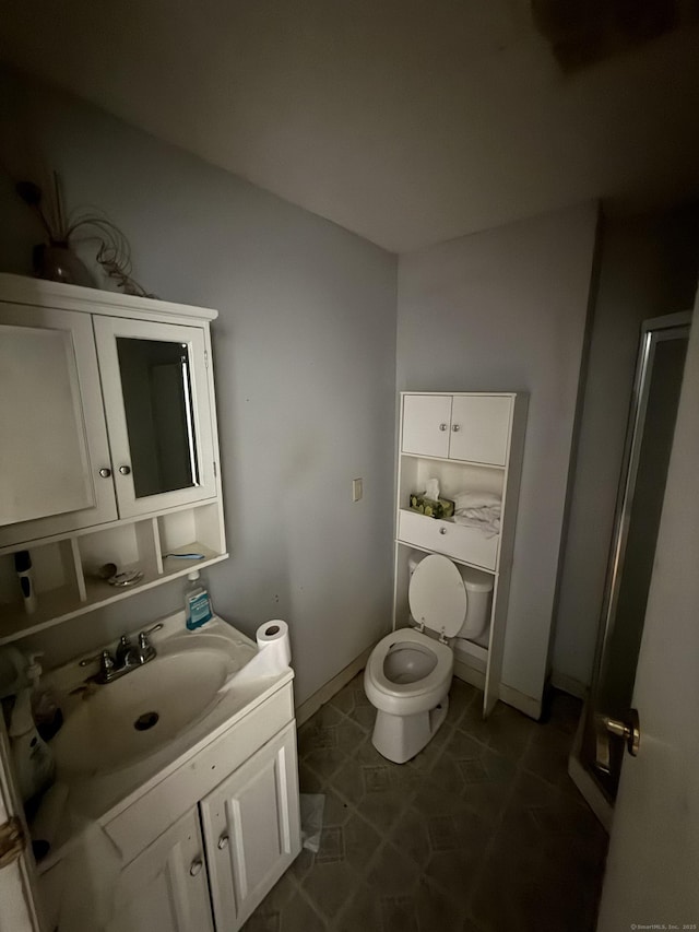 81 Melrose Dr, New Haven, CT 06513 - bathroom with toilet, vanity, and baseboards