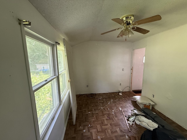 81 Melrose Dr, New Haven, CT 06513 - spare room featuring plenty of natural light, vaulted ceiling, ceiling fan, and a textured ceiling