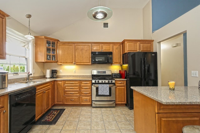 354 Lynne Pl, Bridgeport, CT 06610 - kitchen with black appliances, a sink, brown cabinets, pendant lighting, and high vaulted ceiling