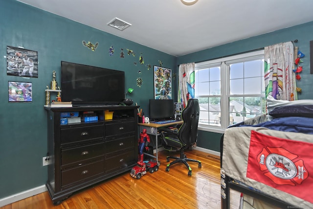 354 Lynne Pl, Bridgeport, CT 06610 - bedroom with wood finished floors and baseboards