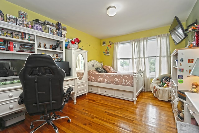 354 Lynne Pl, Bridgeport, CT 06610 - bedroom with a desk and wood finished floors