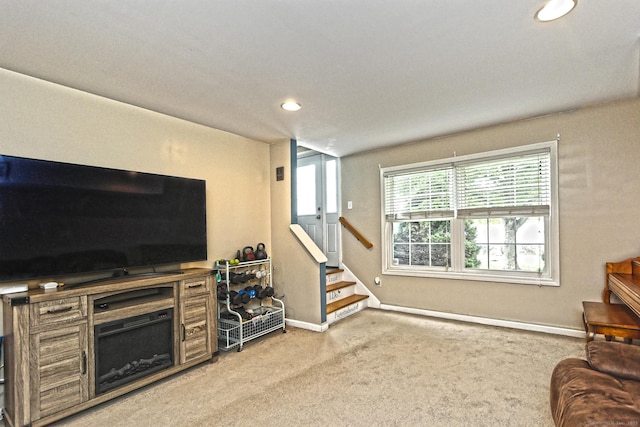 354 Lynne Pl, Bridgeport, CT 06610 - living room with light carpet, recessed lighting, baseboards, and stairway