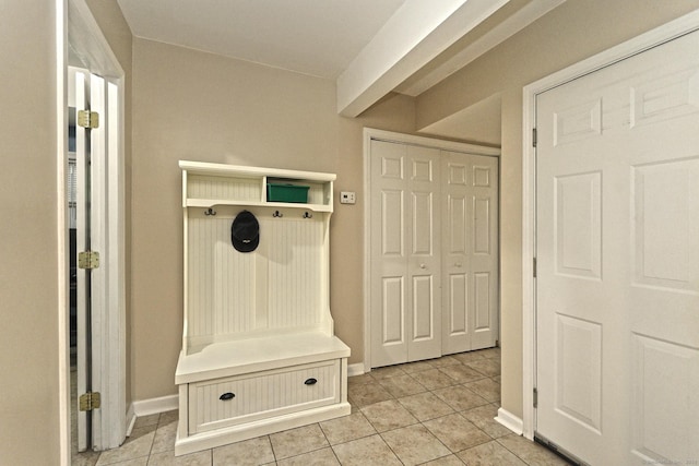 354 Lynne Pl, Bridgeport, CT 06610 - mudroom featuring light tile patterned floors and baseboards