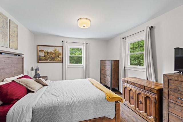 72 Twin Brook Ter, Monroe, CT 06468 - bedroom with multiple windows and wood finished floors