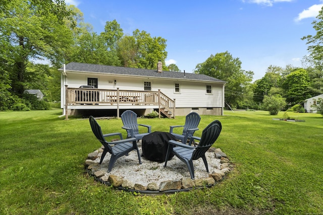 72 Twin Brook Ter, Monroe, CT 06468 - rear view of property with a fire pit, a wooden deck, a lawn, and a chimney