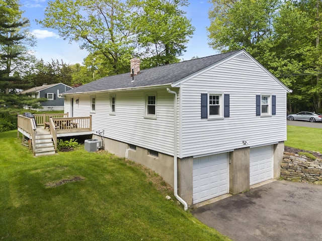 72 Twin Brook Ter, Monroe, CT 06468 - rear view of house featuring driveway, a chimney, a lawn, an attached garage, and a deck
