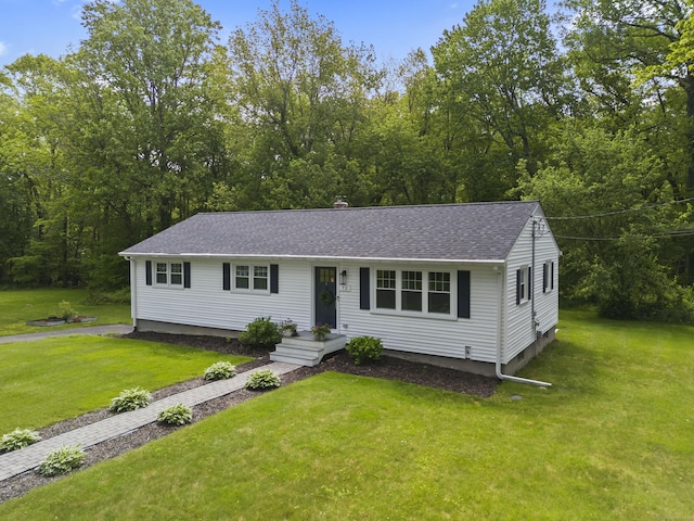 72 Twin Brook Ter, Monroe, CT 06468 - view of front of house with a front lawn and a shingled roof