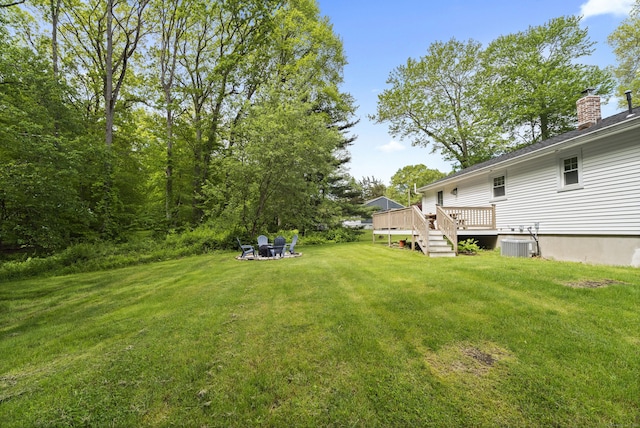 72 Twin Brook Ter, Monroe, CT 06468 - view of green lawn featuring a deck and central air condition unit