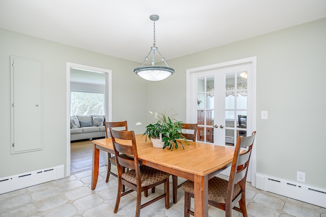 28 Sherry Ln, Danbury, CT 06811 - dining space with a baseboard heating unit, french doors, and light floors