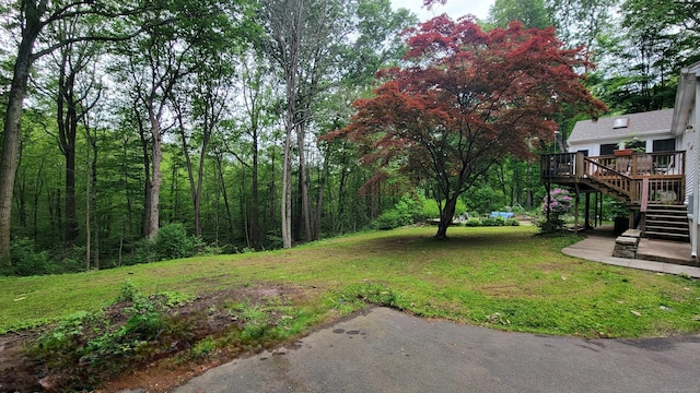 550 W Lake Ave, Guilford, CT 06437 - view of grassy yard with stairs and a wooden deck