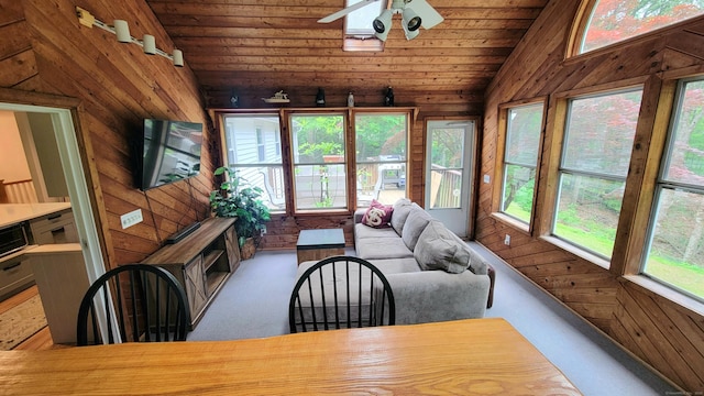 550 W Lake Ave, Guilford, CT 06437 - sunroom featuring wooden walls, carpet, wood ceiling, and high vaulted ceiling