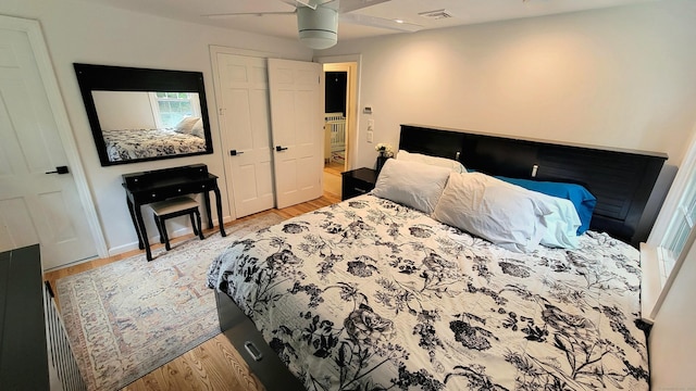 550 W Lake Ave, Guilford, CT 06437 - bedroom with light wood-style flooring and a ceiling fan