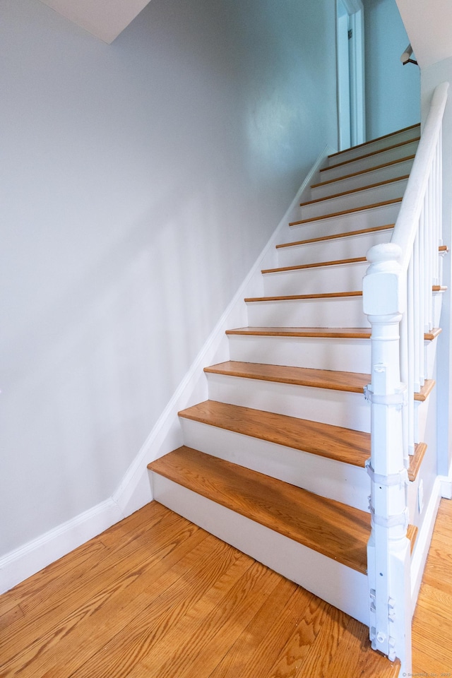 27 Judd Rd, Wethersfield, CT 06109 - stairs with wood finished floors and baseboards