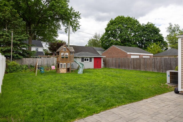 27 Judd Rd, Wethersfield, CT 06109 - view of yard featuring a playground and central air condition unit