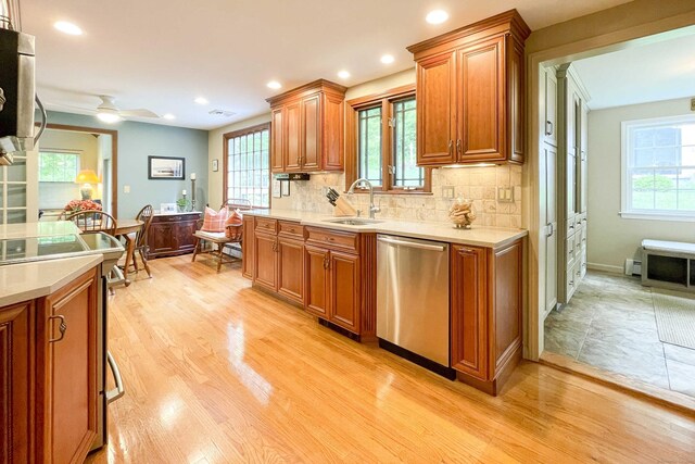 72 Cox Rd, Portland, CT 06480 - kitchen with appliances with stainless steel finishes, a sink, light wood-style floors, light countertops, and recessed lighting