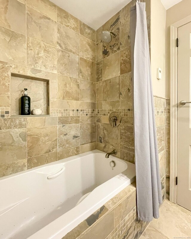 72 Cox Rd, Portland, CT 06480 - full bathroom with tiled shower / bath and tile walls