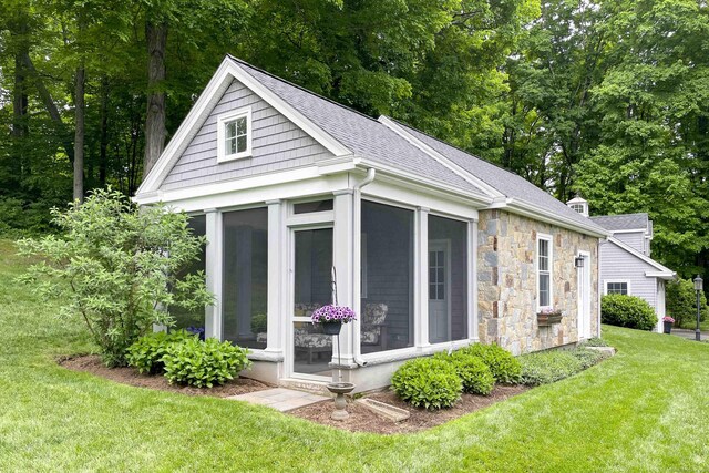 72 Cox Rd, Portland, CT 06480 - view of outdoor structure featuring a sunroom and view of wooded area
