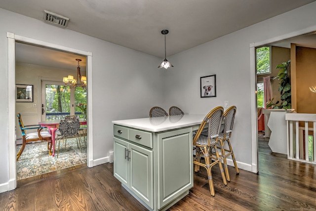 26 Freedman Ln, Monroe, CT 06468 - dining area with dark wood finished floors, baseboards, and a chandelier