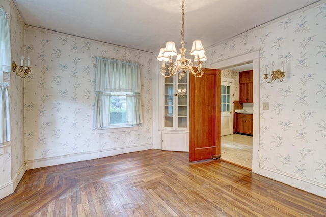 45 Perkins Ave, Norwich, CT 06360 - spare room featuring a chandelier and baseboards