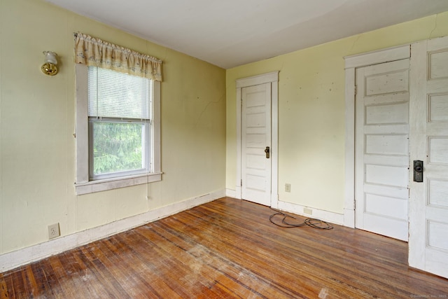45 Perkins Ave, Norwich, CT 06360 - empty room with wood finished floors