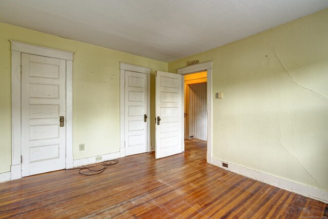 45 Perkins Ave, Norwich, CT 06360 - spare room featuring wood finished floors and baseboards