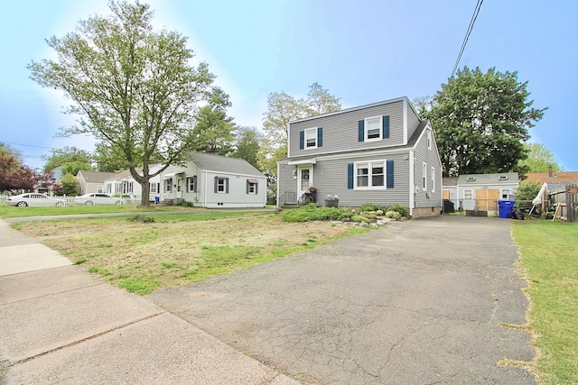 60 Oxford Dr, East Hartford, CT 06118 - view of front of home with driveway and a front yard