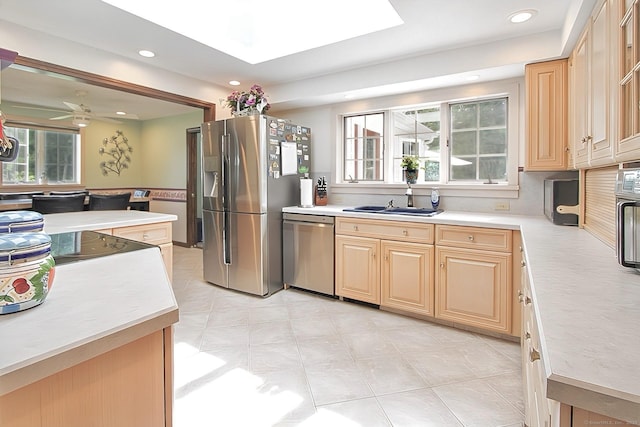 47 Delmont Rd, East Hartford, CT 06108 - kitchen featuring stainless steel appliances, light countertops, a sink, recessed lighting, and light brown cabinets