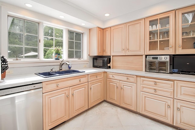 47 Delmont Rd, East Hartford, CT 06108 - kitchen featuring dishwasher, light countertops, a sink, light tile patterned floors, and recessed lighting