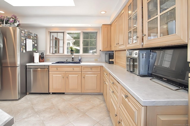 47 Delmont Rd, East Hartford, CT 06108 - kitchen with stainless steel appliances, a sink, light countertops, recessed lighting, and light brown cabinetry