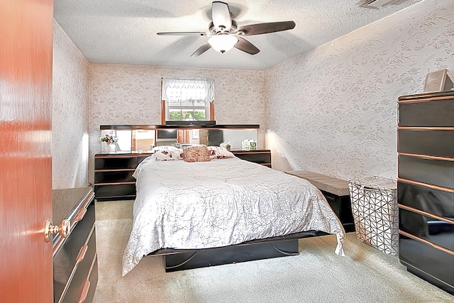 47 Delmont Rd, East Hartford, CT 06108 - carpeted bedroom with a textured ceiling, wallpapered walls, and ceiling fan