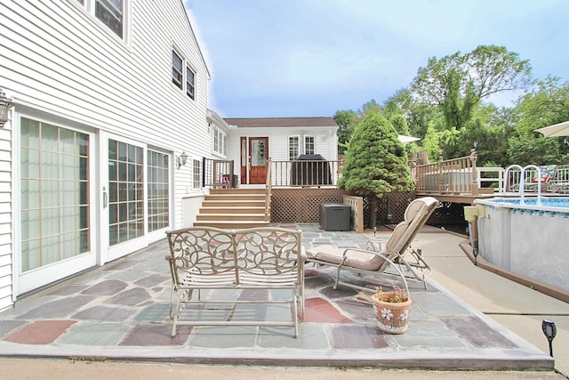 47 Delmont Rd, East Hartford, CT 06108 - view of patio / terrace featuring stairs and a wooden deck