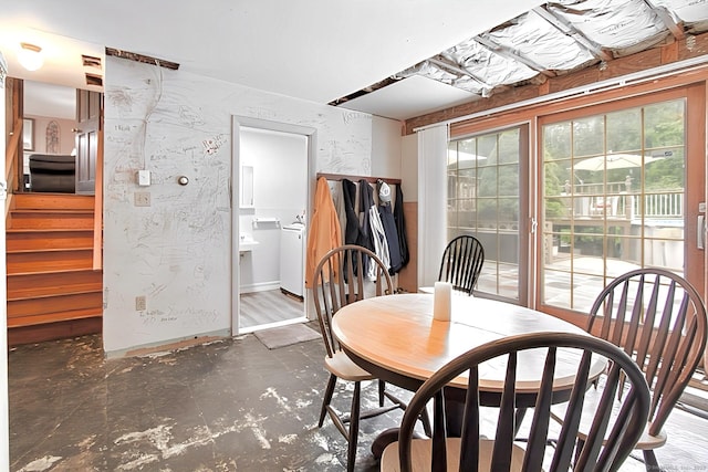 47 Delmont Rd, East Hartford, CT 06108 - dining space with plenty of natural light, washer / dryer, and stairs