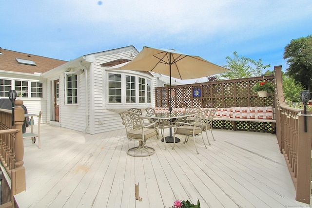 47 Delmont Rd, East Hartford, CT 06108 - wooden deck with outdoor dining area