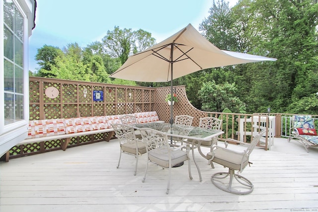 47 Delmont Rd, East Hartford, CT 06108 - wooden terrace with outdoor dining space