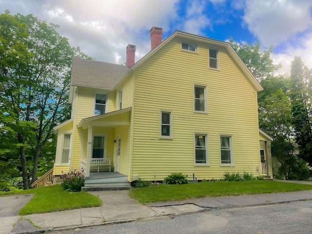 88 Strong Ter, Winchester, CT 06098 - view of front of house with a chimney, a front lawn, and a shingled roof