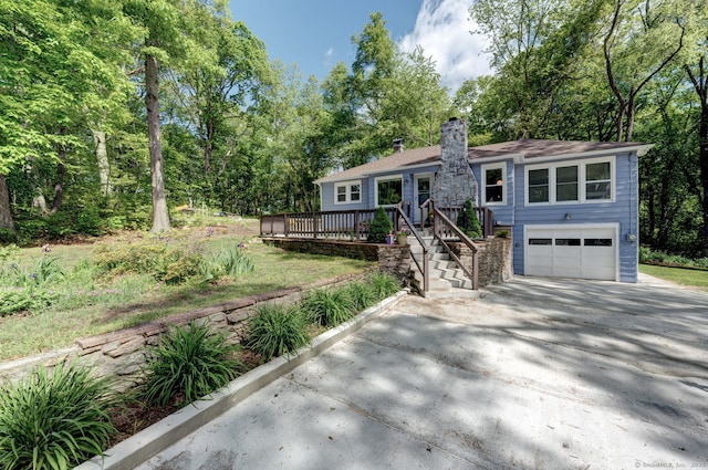 187 W Main St, East Lyme, CT 06357 - ranch-style house with driveway, a chimney, a wooden deck, an attached garage, and stairway