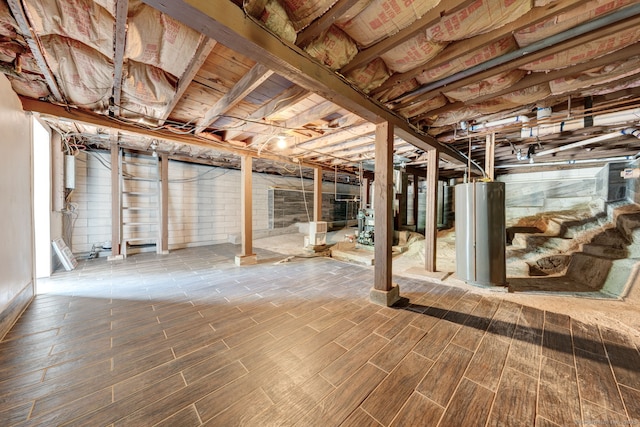 187 W Main St, East Lyme, CT 06357 - unfinished basement featuring water heater and wood finished floors
