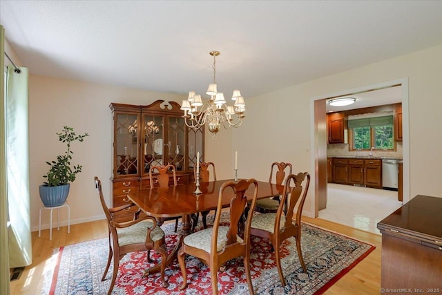 109 Edstrom Rd, Marlborough, CT 06447 - dining area featuring a chandelier and light wood finished floors