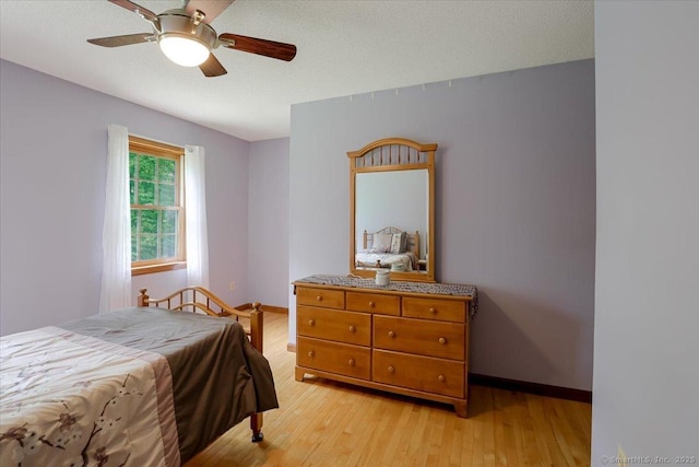 109 Edstrom Rd, Marlborough, CT 06447 - bedroom with light wood-style floors, baseboards, and a ceiling fan