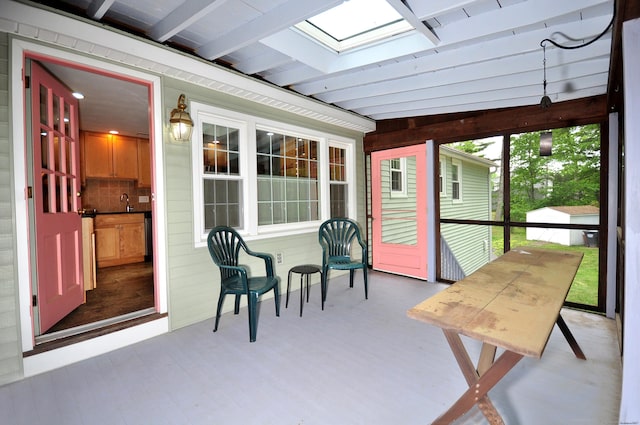 83 Elizabeth St, South Windsor, CT 06074 - sunroom / solarium featuring a skylight and a sink