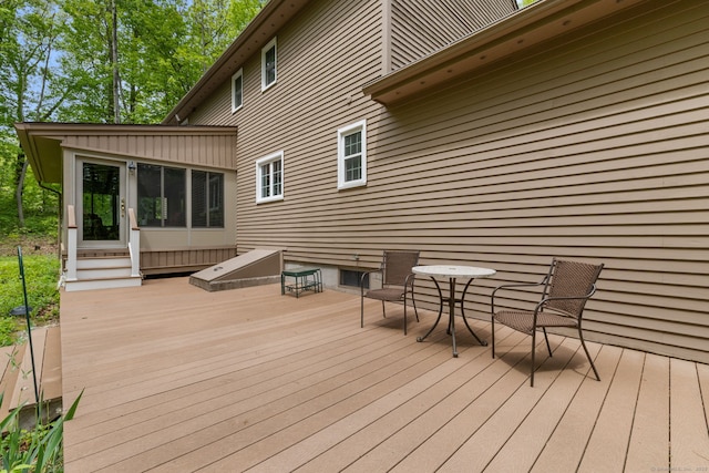 61 Winding Rdg, Southington, CT 06489 - wooden deck featuring a sunroom and entry steps