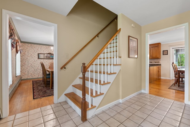 61 Winding Rdg, Southington, CT 06489 - staircase featuring baseboard heating, tile patterned flooring, baseboards, and ornamental molding